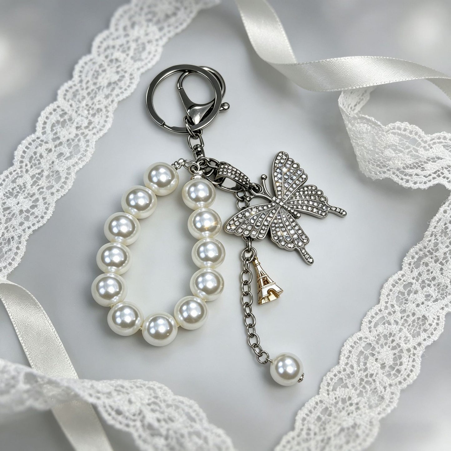 Butterfly Bling Keychain – Pearl & Crystal Diamond Accent Charm